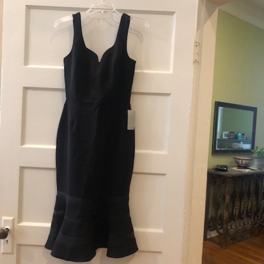 Adelyn Rae black fish tail dress